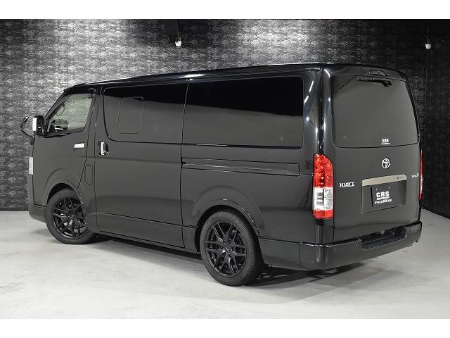 ハイエースバン スーパーGL ダークプライムII ダークプライムII/ディーゼル/小窓付きスライドドア/ローダウン/ビッグX/アルパイン/ドライブレコーダー/Aピラーツィーター/クラフトプラス/収納付きベッドキット/18インチ/2インチローダウン(3枚目)