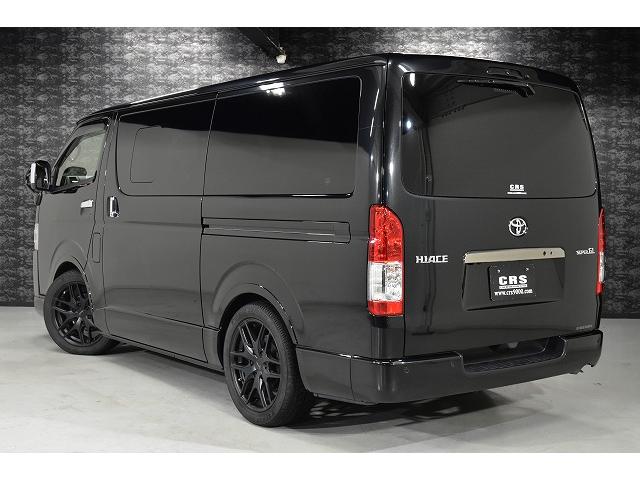 ハイエースバン スーパーGL ダークプライムII ダークプライムII/ディーゼル/小窓付きスライドドア/ローダウン/ビッグX/アルパイン/ドライブレコーダー/Aピラーツィーター/クラフトプラス/収納付きベッドキット/18インチ/2インチローダウン(22枚目)