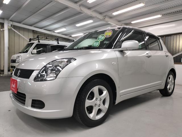 スイフト １．３ＸＧ　リミテッド　禁煙車　特別仕様車　５速マニュアルミッション　本革巻きステアリング　スマートキー　オートエアコン　社外シフトノブ　純正フロアマット　純正ドアバイザー　Ｗエアバッグ　ＡＢＳ　ヘアラインアルミ調オーディオ（15枚目）