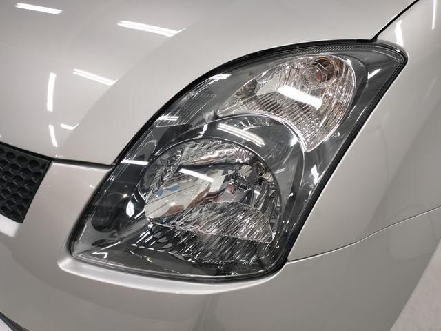 スイフト １．３ＸＧ　リミテッド　禁煙車　特別仕様車　５速マニュアルミッション　本革巻きステアリング　スマートキー　オートエアコン　社外シフトノブ　純正フロアマット　純正ドアバイザー　Ｗエアバッグ　ＡＢＳ　ヘアラインアルミ調オーディオ（19枚目）