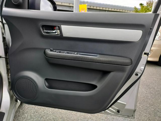 スイフト １．３ＸＧ　リミテッド　禁煙車　特別仕様車　５速マニュアルミッション　本革巻きステアリング　スマートキー　オートエアコン　社外シフトノブ　純正フロアマット　純正ドアバイザー　Ｗエアバッグ　ＡＢＳ　ヘアラインアルミ調オーディオ（42枚目）