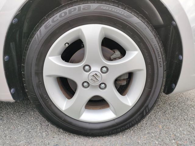 スイフト １．３ＸＧ　リミテッド　禁煙車　特別仕様車　５速マニュアルミッション　本革巻きステアリング　スマートキー　オートエアコン　社外シフトノブ　純正フロアマット　純正ドアバイザー　Ｗエアバッグ　ＡＢＳ　ヘアラインアルミ調オーディオ（57枚目）