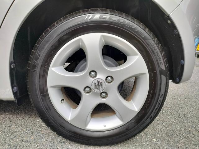 スイフト １．３ＸＧ　リミテッド　禁煙車　特別仕様車　５速マニュアルミッション　本革巻きステアリング　スマートキー　オートエアコン　社外シフトノブ　純正フロアマット　純正ドアバイザー　Ｗエアバッグ　ＡＢＳ　ヘアラインアルミ調オーディオ（59枚目）