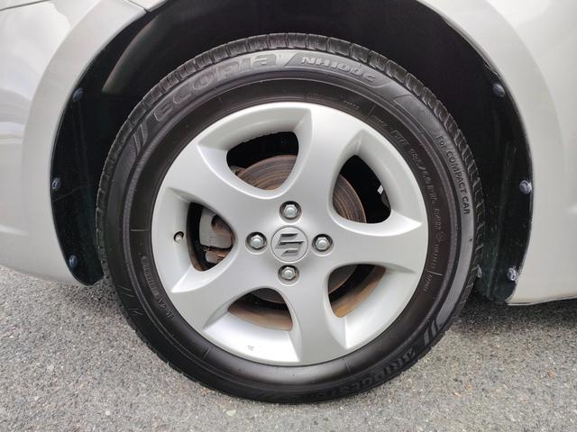 スイフト １．３ＸＧ　リミテッド　禁煙車　特別仕様車　５速マニュアルミッション　本革巻きステアリング　スマートキー　オートエアコン　社外シフトノブ　純正フロアマット　純正ドアバイザー　Ｗエアバッグ　ＡＢＳ　ヘアラインアルミ調オーディオ（60枚目）