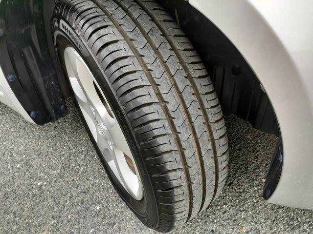 スイフト １．３ＸＧ　リミテッド　禁煙車　特別仕様車　５速マニュアルミッション　本革巻きステアリング　スマートキー　オートエアコン　社外シフトノブ　純正フロアマット　純正ドアバイザー　Ｗエアバッグ　ＡＢＳ　ヘアラインアルミ調オーディオ（61枚目）