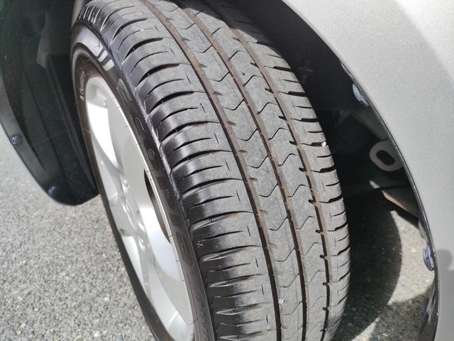 スイフト １．３ＸＧ　リミテッド　禁煙車　特別仕様車　５速マニュアルミッション　本革巻きステアリング　スマートキー　オートエアコン　社外シフトノブ　純正フロアマット　純正ドアバイザー　Ｗエアバッグ　ＡＢＳ　ヘアラインアルミ調オーディオ（63枚目）