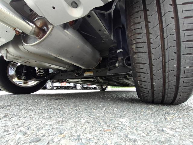 スイフト １．３ＸＧ　リミテッド　禁煙車　特別仕様車　５速マニュアルミッション　本革巻きステアリング　スマートキー　オートエアコン　社外シフトノブ　純正フロアマット　純正ドアバイザー　Ｗエアバッグ　ＡＢＳ　ヘアラインアルミ調オーディオ（67枚目）