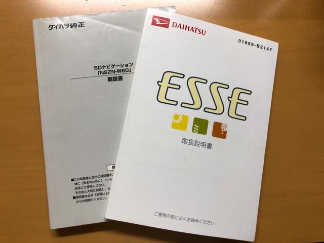 エッセ カスタム　５ＭＴ　記録簿付き　ナビ　ＴＶ　セキュリティ　純正エアロ　ミニライト１５インチアルミホイール　キーレス（26枚目）