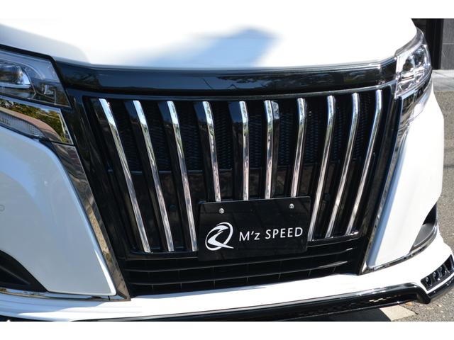 ハイブリッドGiプレミアムパッケジブラックテーラード 7人乗 ZEUS新車カスタムコンプリートカー・エアロ・F/S/R・グリル・FT・リアウィング・メッキピラー・車高調・19インチAW・マフラー・アルパイン11型ナビ・ETC・バックカメラ(12枚目)