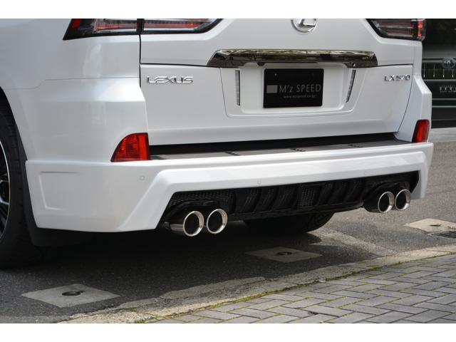 LX570 ZEUS新車カスタムコンプリートカー・エアロ3点・4灯フォグ・22インチアルミ・4本出マフラー・マークレビンソン・リアエンターテイメントシステム・置くだけ充電(14枚目)