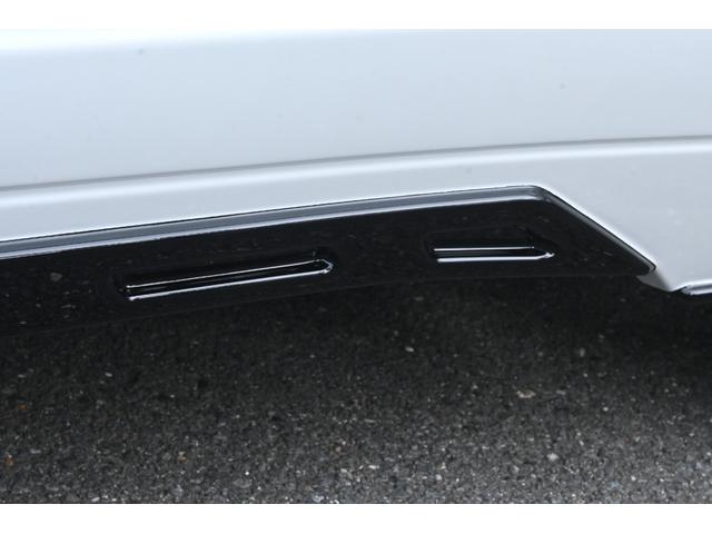 ハリアーハイブリッド Z レザーパッケージ・ナイトシェード ZEUSエアロ(F/S/R)・フロントグリル・ドアミラーカバー・カーボン調ピラーパネル・リアゲートスポイラー・2本出しマフラーカッター・22インチAW・ダウンサス・パノラマルーフ・スペアタイヤ・ITS(21枚目)