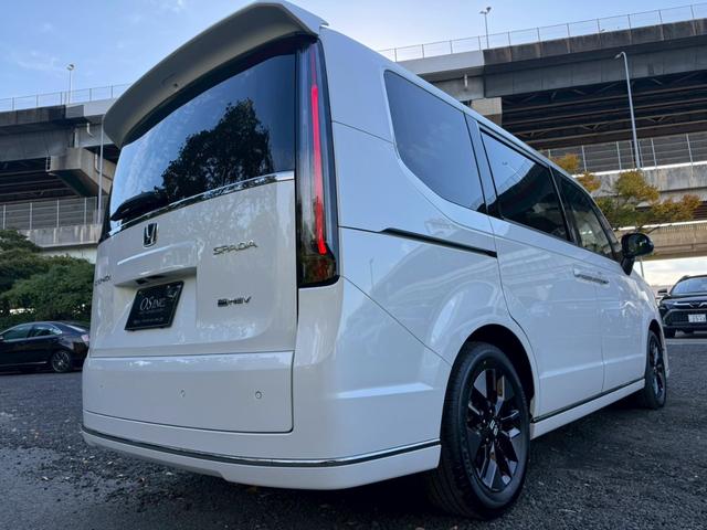 ステップワゴン ｅ：ＨＥＶスパーダ／新車未登録　／衝突軽減／レーダークルーズ／レーンキープ／両側パワースライドドア／コーナーセンサー／シートヒーター／パワーバックドア／ハーフレザーシート／オートライト／プッシュスタート／ＵＳＢ接続（22枚目）