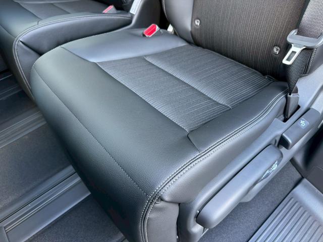 ステップワゴン ｅ：ＨＥＶスパーダ／新車未登録　／衝突軽減／レーダークルーズ／レーンキープ／両側パワースライドドア／コーナーセンサー／シートヒーター／パワーバックドア／ハーフレザーシート／オートライト／プッシュスタート／ＵＳＢ接続（67枚目）