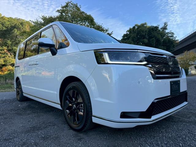 ステップワゴン ｅ：ＨＥＶスパーダ／新車未登録　／衝突軽減／レーダークルーズ／レーンキープ／両側パワースライドドア／コーナーセンサー／シートヒーター／パワーバックドア／ハーフレザーシート／オートライト／プッシュスタート／ＵＳＢ接続（13枚目）