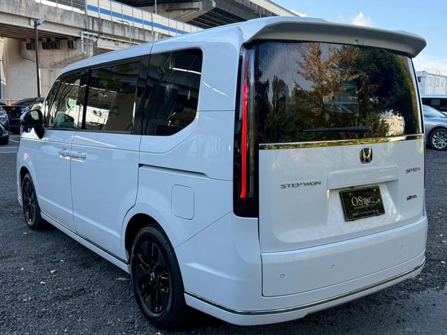 ステップワゴン ｅ：ＨＥＶスパーダ／新車未登録　／衝突軽減／レーダークルーズ／レーンキープ／両側パワースライドドア／コーナーセンサー／シートヒーター／パワーバックドア／ハーフレザーシート／オートライト／プッシュスタート／ＵＳＢ接続（25枚目）