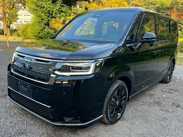 ステップワゴン e:HEVスパーダ/新車未登録 /衝突軽減/レーダークルーズ/レーンキープ/両側パワースライドドア/コーナーセンサー/シートヒーター/パワーバックドア/ハーフレザーシート/オートライト/プッシュスタート/USB接続(6枚目)