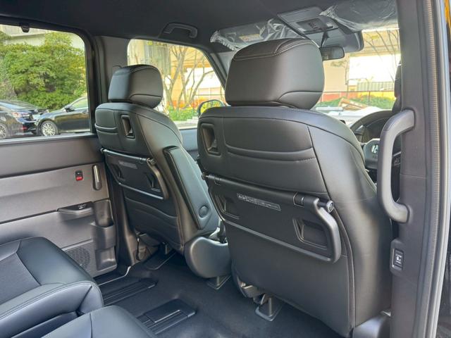 ステップワゴン e:HEVスパーダ/新車未登録 /衝突軽減/レーダークルーズ/レーンキープ/両側パワースライドドア/コーナーセンサー/シートヒーター/パワーバックドア/ハーフレザーシート/オートライト/プッシュスタート/USB接続(57枚目)