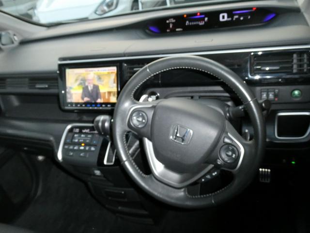 ステップワゴンスパーダ スパーダ・クールスピリット　ホンダセンシング　純正９インチフルセグナビ　ＤＶＤ再生　ＢＴオーディオ　リヤモニター　ドライブレコーダー　ＥＴＣ　バックカメラ　両側電動スライドドア　アダプティブクルコン　ＬＥＤヘッド　シートヒーター　禁煙ワンオーナー（69枚目）