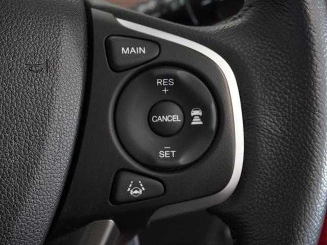 フリードハイブリッド ハイブリッド・クロスターホンダセンシング　１年保証　９インチナビ　フルセグ　Ｒカメラ　ＬＥＤヘッドライト＋アクティブコーナリングライト　センターテーブル　オートリトラミラー　Ｃパッケージ　オートライト　リア両側パワースライドドア（9枚目）
