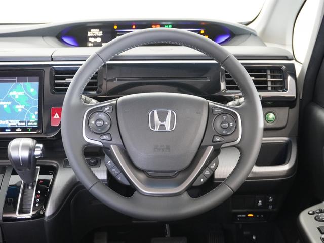 ステップワゴンスパーダ スパーダホンダセンシング　９インチナビ　リアカメラ　フリップダウンモニター　わくわくゲート　２列目６：４分割ベンチシート（７人乗り）　１６ＡＷ　ＬＥＤヘッドライト　フルセグ　オートライト　パドルシフト　前後ドラレコ（11枚目）
