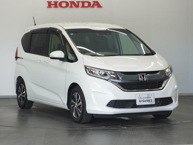 フリード Ｇ・ホンダセンシング　１年保証　７インチナビ　リアカメラ　後席フリップダウンモニター　２列目ベンチシート（７人乗り）　リア両側パワースライドドア　ＬＥＤヘッドライト＋アクティブコーナーリングライト　センターテーブル（14枚目）