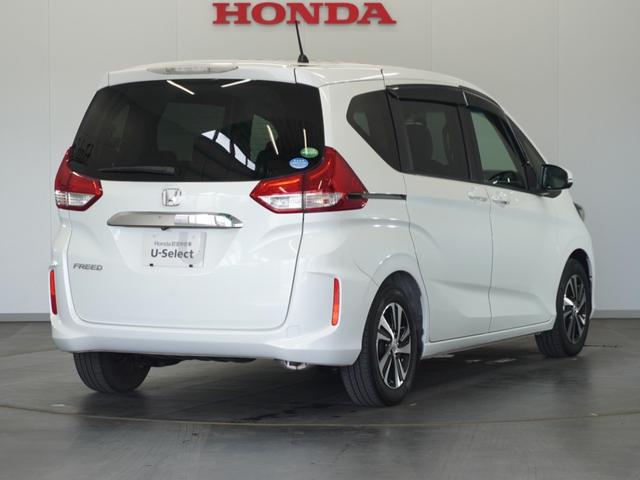 フリード Ｇ・ホンダセンシング　１年保証　７インチナビ　リアカメラ　後席フリップダウンモニター　２列目ベンチシート（７人乗り）　リア両側パワースライドドア　ＬＥＤヘッドライト＋アクティブコーナーリングライト　センターテーブル（15枚目）