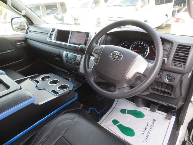 ハイエースワゴン ＧＬ　ＲＥＶＯシート　対面シート　１０人乗り　ベッドキット　２段ベット　テーブル　フローリング調　社外コンソールＢＯＸ　電動スライド　社外１５ＡＷ　ナビ　地デジ　Ｂカメラ　リアモニター　ＬＥＤライト　Ｓキー（36枚目）