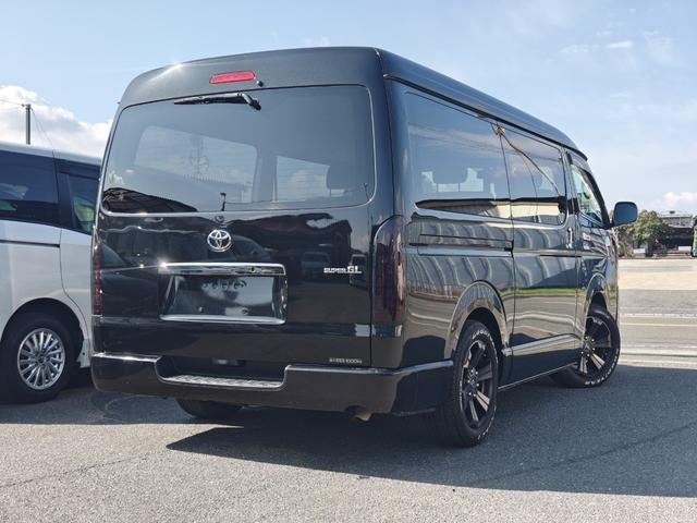 ハイエースバン ロングワイドスーパーGL ダークプライム 後期6速AT 両側電動ドア mObeLベッドキット ナビ フルセグ ブルートゥースオーディオ バックカメラ バルベロ17アルミ ナスカーホワイトレタータイヤ ローダウン LEDテール(7枚目)