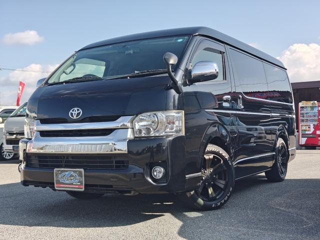 ハイエースバン ロングワイドスーパーGL ダークプライム 後期6速AT 両側電動ドア mObeLベッドキット ナビ フルセグ ブルートゥースオーディオ バックカメラ バルベロ17アルミ ナスカーホワイトレタータイヤ ローダウン LEDテール(8枚目)