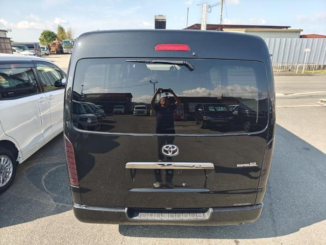 ハイエースバン ロングワイドスーパーGL ダークプライム 後期6速AT 両側電動ドア mObeLベッドキット ナビ フルセグ ブルートゥースオーディオ バックカメラ バルベロ17アルミ ナスカーホワイトレタータイヤ ローダウン LEDテール(26枚目)