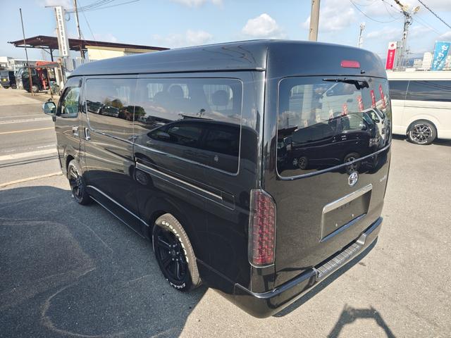 ハイエースバン ロングワイドスーパーGL ダークプライム 後期6速AT 両側電動ドア mObeLベッドキット ナビ フルセグ ブルートゥースオーディオ バックカメラ バルベロ17アルミ ナスカーホワイトレタータイヤ ローダウン LEDテール(27枚目)