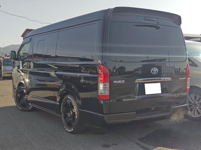 ハイエースバン スーパーGL ダークプライムII ワイドボディ 4WD エアロ 17アルミ リアスライドフロア デジタルインナーミラー パノラミックビューモニター ホワイトレタータイヤ 大型センターコンソール 寒冷地仕様 ナビ フルセグ BT(2枚目)