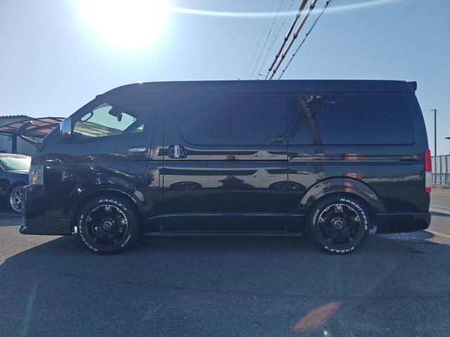 ハイエースバン スーパーGL ダークプライムII ワイドボディ 4WD エアロ 17アルミ リアスライドフロア デジタルインナーミラー パノラミックビューモニター ホワイトレタータイヤ 大型センターコンソール 寒冷地仕様 ナビ フルセグ BT(5枚目)