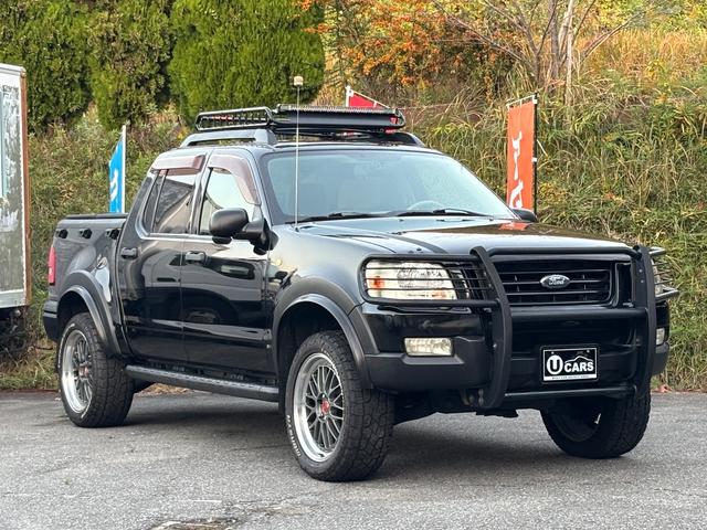 エクスプローラースポーツトラック ＸＬＴ　リフトアップ　社外２０インチアルミ　社外ナビ　フルセグＴＶ　バックカメラ（8枚目）