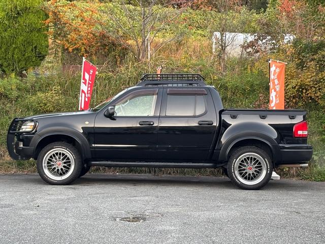 エクスプローラースポーツトラック ＸＬＴ　リフトアップ　社外２０インチアルミ　社外ナビ　フルセグＴＶ　バックカメラ（13枚目）