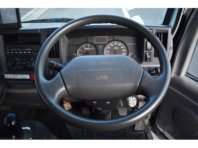 エルフトラック フルフラットロー 積載2000kg MT 車両総重量4265kg オンダッシュナビ フォグランプ 坂道発進補助装置 電格ミラー アイドリングストップ(3枚目)