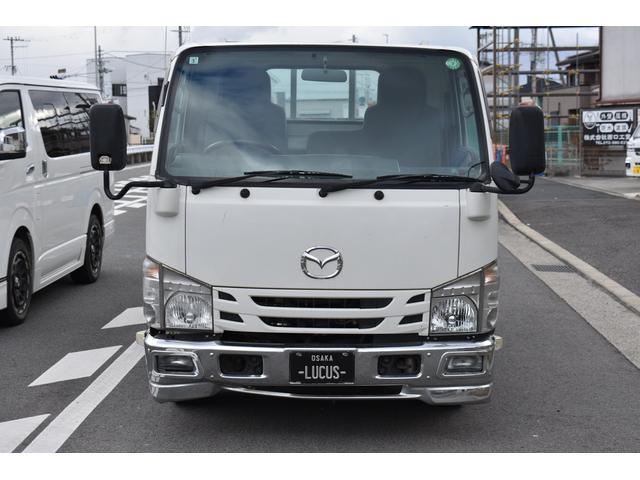 タイタントラック フルワイドロー　積載１５００ｋｇ　ＡＴ　車両総重量３８４５ｋｇ　ＥＴＣ　電格ミラー　社外ナビ　アイドリングストップ　荷台鉄板　助手席エアバック（4枚目）