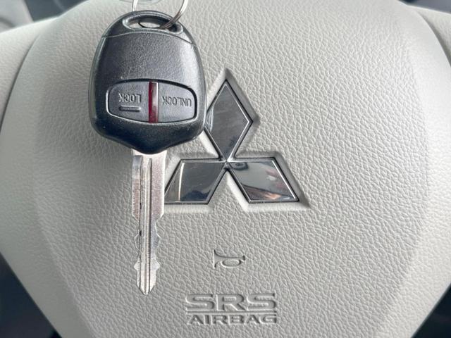 eKワゴン E イクリプスナビ 運転席シートヒーター リモコンキー バニティミラー ヘッドライトレベライザー プライバシーガラス 電動格納ミラー ダイヤルエアコン(4枚目)