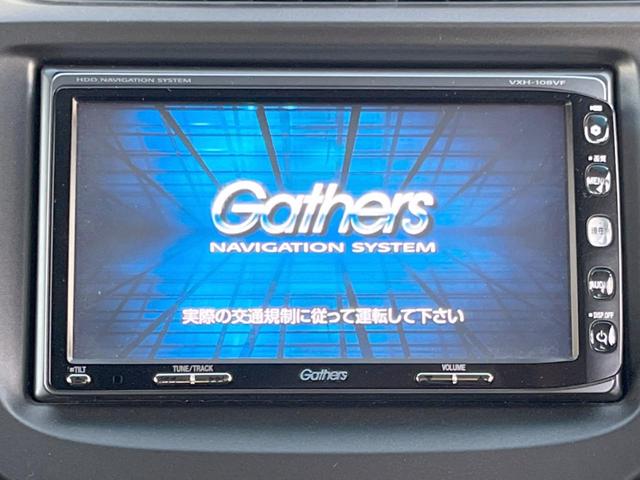 フィット RS 純正ナビ バックカメラ ETC HIDヘッドライト 純正16インチアルミホイール パドルシフト リモコンキー 革巻きステアリング バニティミラー セキュリティアラーム(3枚目)