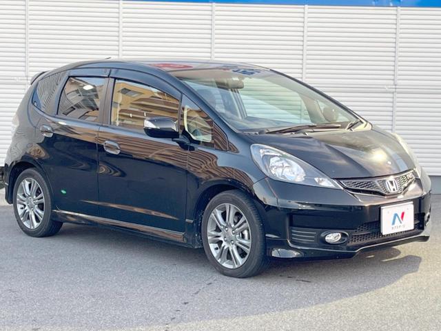 フィット RS 純正ナビ バックカメラ ETC HIDヘッドライト 純正16インチアルミホイール パドルシフト リモコンキー 革巻きステアリング バニティミラー セキュリティアラーム(16枚目)