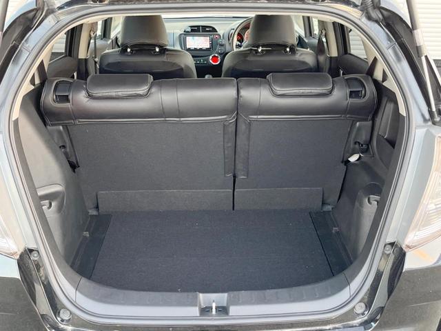 フィット RS 純正ナビ バックカメラ ETC HIDヘッドライト 純正16インチアルミホイール パドルシフト リモコンキー 革巻きステアリング バニティミラー セキュリティアラーム(36枚目)