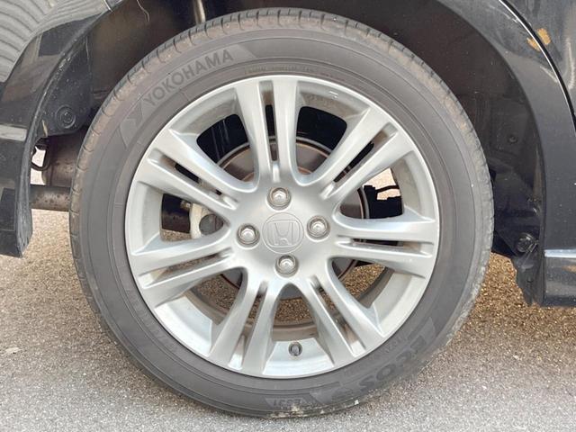 フィット RS 純正ナビ バックカメラ ETC HIDヘッドライト 純正16インチアルミホイール パドルシフト リモコンキー 革巻きステアリング バニティミラー セキュリティアラーム(46枚目)