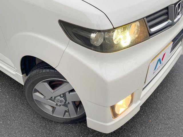 ゼストスパーク Ｗターボ　ケンウッドナビ　バックカメラ　ＥＴＣ　ＨＩＤヘッドライト　純正１４インチアルミホイール　スマートキーシステム　革巻きステアリング　オートエアコン　バニティミラー　プライバシーガラス（12枚目）