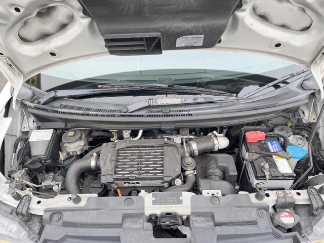 ゼストスパーク Ｗターボ　ケンウッドナビ　バックカメラ　ＥＴＣ　ＨＩＤヘッドライト　純正１４インチアルミホイール　スマートキーシステム　革巻きステアリング　オートエアコン　バニティミラー　プライバシーガラス（18枚目）