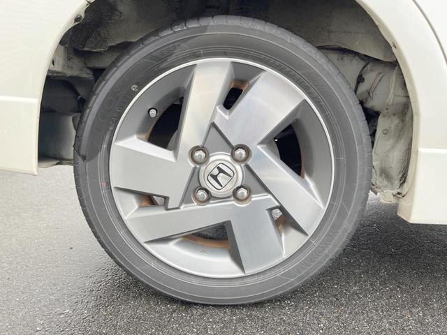 ゼストスパーク Ｗターボ　ケンウッドナビ　バックカメラ　ＥＴＣ　ＨＩＤヘッドライト　純正１４インチアルミホイール　スマートキーシステム　革巻きステアリング　オートエアコン　バニティミラー　プライバシーガラス（43枚目）