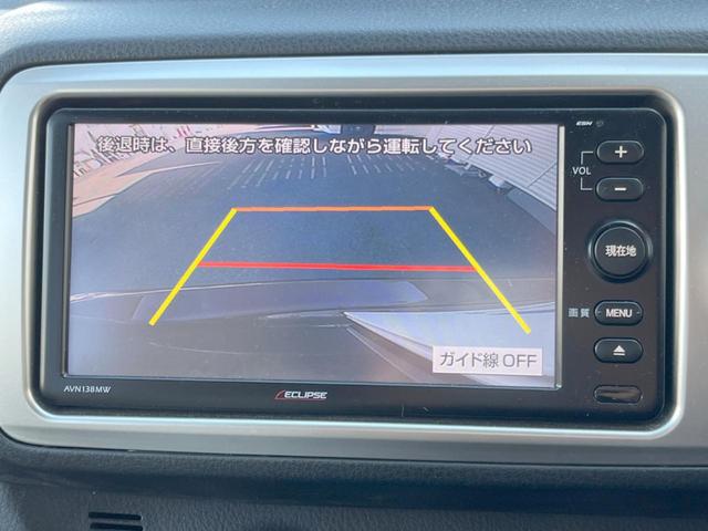 ヴィッツ Ｆ　イクリプスナビ　バックカメラ　ＥＴＣ　スマートエントリー　プッシュスタート　アイドリングストップ　バニティミラー　イモビライザー　ダイヤル式エアコン　プライバシーガラス　ＡＢＳ（4枚目）