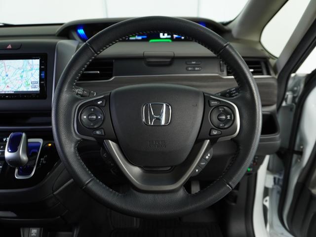 フリードハイブリッド ハイブリッド・ＥＸ　６人乗り／衝突被害軽減システム／純正ナビゲーション／バックカメラ／フルセグＴＶ／Ｂｌｕｅｔｏｏｔｈ接続音楽再生／ＬＥＤヘッドライト／両側電動スライドドア／シートヒーター／クルーズコントロール／ＥＴＣ（8枚目）