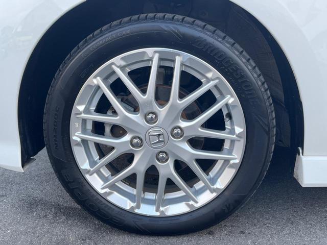 N-BOXカスタム Lターボ 禁煙車 純正9インチナビ ホンダセンシング 両側パワースライドドア レーダークルーズ ETC ドライブレコーダー ハーフレザーシート 革巻きステアリング スマートキー(15枚目)