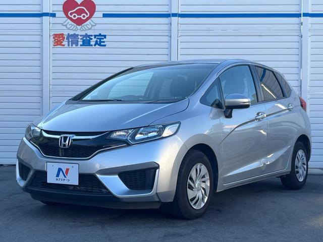 フィット １３Ｇ・Ｆパッケージ　禁煙車　純正ナビ　バックカメラ　アイドリングストップ　電動格納ミラー　スマートキー　ヘッドレベライザー　ステアリングリモコン　セキュリティアラーム（21枚目）