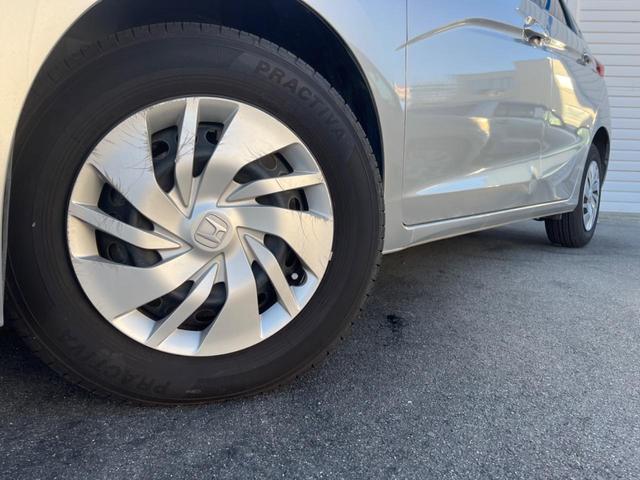 フィット １３Ｇ・Ｆパッケージ　禁煙車　純正ナビ　バックカメラ　アイドリングストップ　電動格納ミラー　スマートキー　ヘッドレベライザー　ステアリングリモコン　セキュリティアラーム（24枚目）